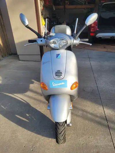 Silver Vespa was changed to 100cc. Just spend $780 on new tires, new brakes, and a tune up.