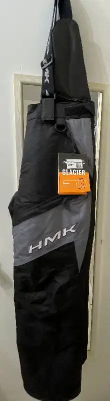 Brand New, never been used Gray Medium - but it will fit someone who is in the lower end of large si...