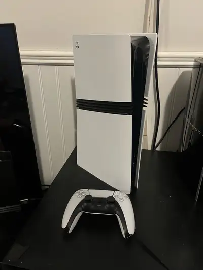 PS5 Pro with controller , View more