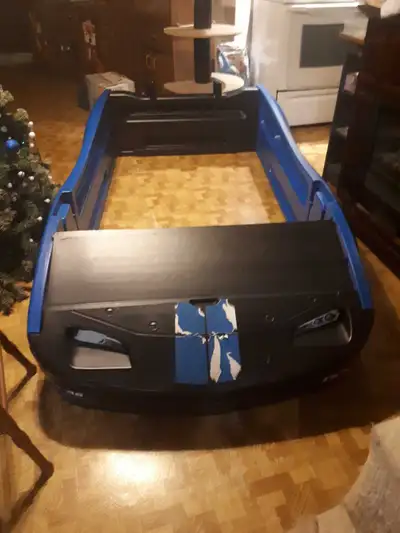 I have a blue Delta children's sport race car twin Bed for sale. They'l race off to dreamland with t...