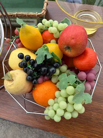 I have a fruit bowl and some prop fruit for sale. They're in used condition, perfect for adding a to...