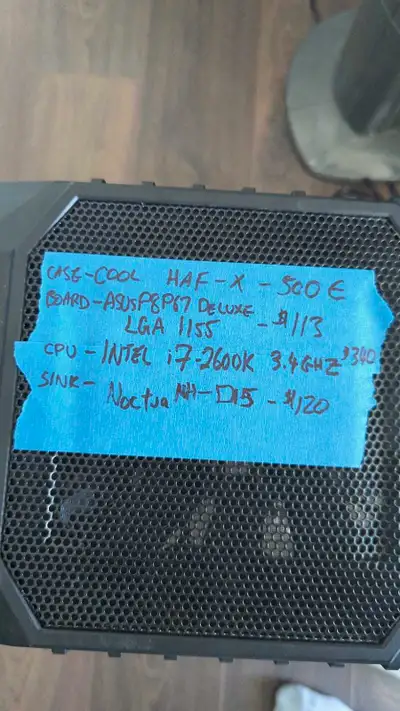 Selling a used Cooler Master HAF-X case that houses an ASUS P8P67 Deluxe motherboard, an Intel i7-26...