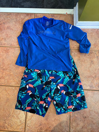 Kids size 14/16 swim trunks and UV shirt
