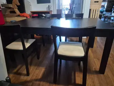 Large diningroom table with 4 chairs. Also includes 2 expander leaves. Table is 69"x37.5". Each leaf...
