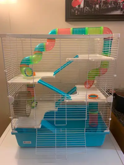 4 level hamster cage with tunnels, comes with everything you need to get started. Food, snacks, bedd...