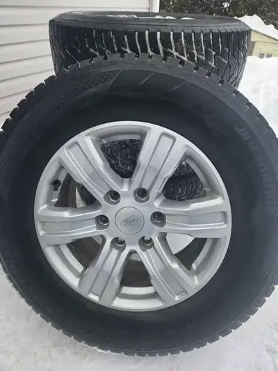 The 255/65R17 tires have alloy rims and 4 brand new tire pressure sensors. 6 stud x 135 mm, removed...