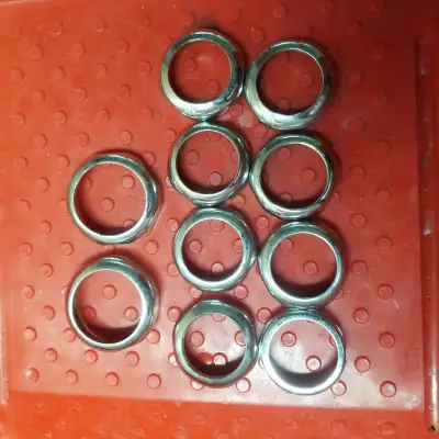 Here we have an assortment of faucet rings and washers, perfect for plumbing repairs or DIY projects...