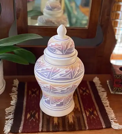 Vintage Navajo vase/urn by artist Sue T. Signed by Sue Tom and it appears from what I can gather, sh...