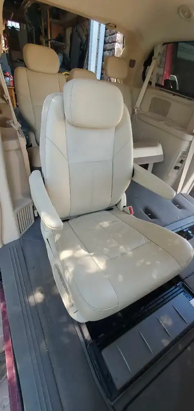 Make an offer. From Town and Country fits Dodge Caravan mid row seats. Super beautiful "heated" tan...