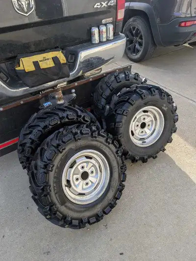 Front tires and rims. Wing brand AT26x10-12 Excellent shape. No cracks Lots of tread left. The rims...