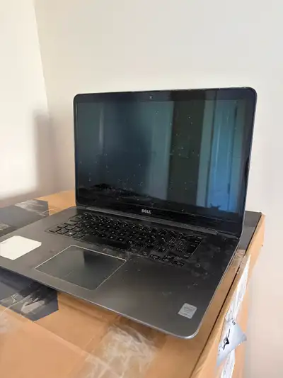 15.6-inch Dell Inspiron 15 7547 laptop featuring an aluminum chassis, Intel Core i7 processors, and...