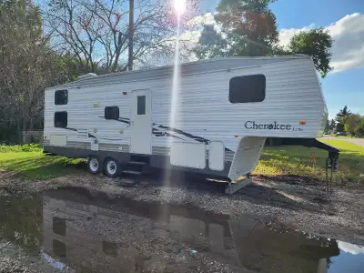 Open to reasonable offers. Would love to see it gone. Fifth Wheel Camper - sleeps 6 (single over dou...