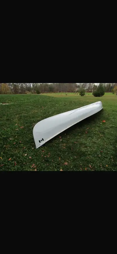 This canoe features a fresh coat of skyblue paint and is ready for the water! It is in good conditio...