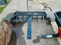 Lawn tractor attachments