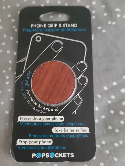 Brand new One is wood look and other is matte black Asking $7 each