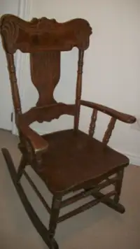 antique rocking chair,very nice carvings and good condition,