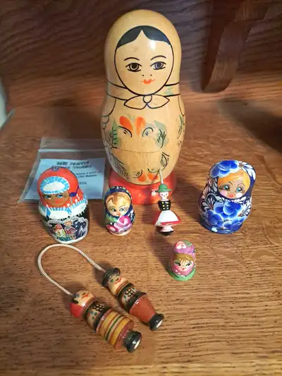 All 7 items for $8. 1) Hand painted thimble 2) Mini wooden doll couple 3) Blue matryoshka doll magne...