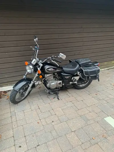 Suzuki Marauder 250. Runnung well. Excellent starter bike with cruiser styling. Saddle bags included...