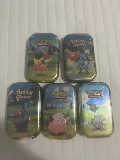 Ascended Heroes Mini Tins, View more