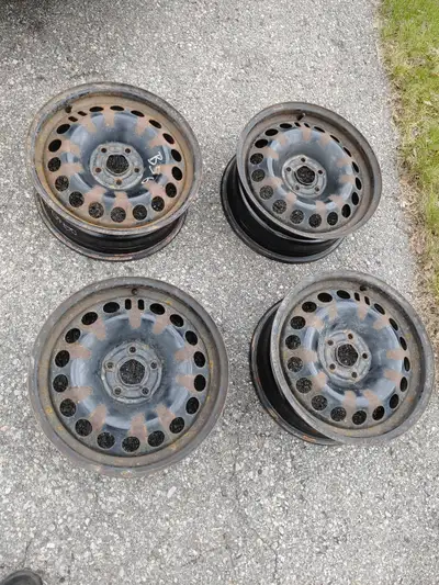 4 16 inch steel rims GM oem had 215/60/16 tires on them. $100 obo