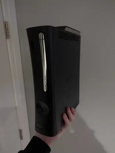 Hey there, Selling my hacked 120GB Xbox 360, along with the power brick and a wireless controller. I...