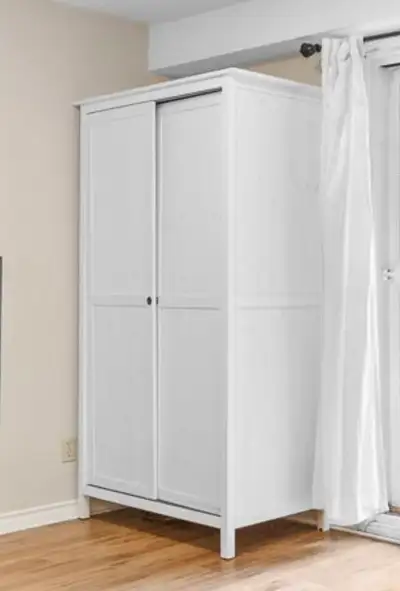 IKEA cupboard/wardrobe with sliding doors, View more
