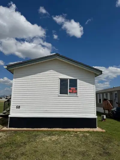 Located in the desirable community of Mackenzie Ranch Estates in Lacombe. I have a 2007 mobile home...