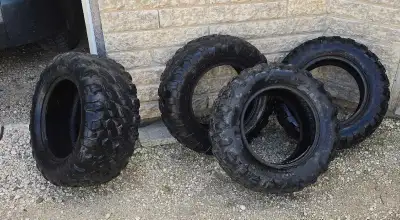 I am selling a set of four Carlisle atv tires, consisting of two 26x9-14 front tires and two 26x11-1...