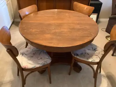 Oak round dining room table and 4 chairs, View more