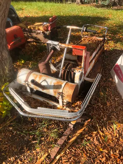 Polaris built snowmobile sold by Marshall Wells. As chassis is all-factory white. a very rare pc of...