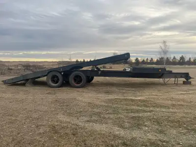 For sale or trade. Motivated seller. 28 foot tandem axle utility trailer. Tilting deck. Tandem Axle...