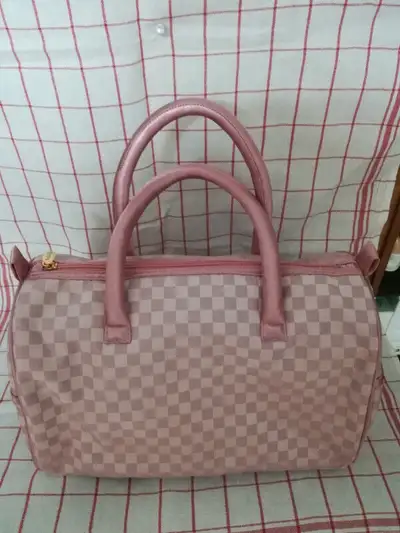 If the ad is still up, it is available! Naraya Handbag, Good Condition