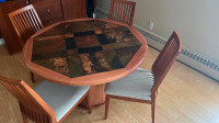 Teak table with stone tiles