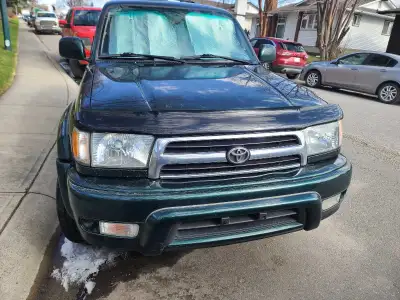 Selling my active status 2000 toyota 4Runner limited with rare green exterior very nice condition le...