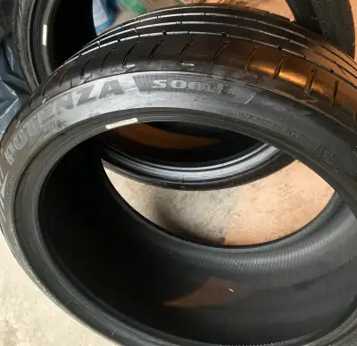 set of two (only 2 available) Bridgestone POTENZA S001L all season performance tires off rim very go...
