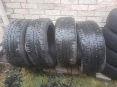 Set of 4 Michelin X-ice 245-45-19 still good condition, no cuts no holes .