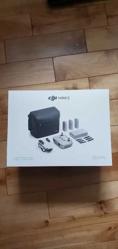 NEUF, DJI Mini 2 drone (combo fly more). Image 4K. Aucun échange. Demande 350$ chacun (2 drones disp...