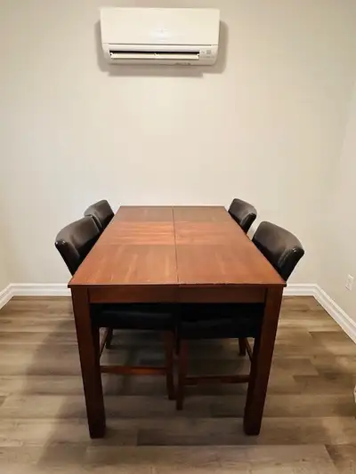 Executive dining table set measure 54" x 54" 3 section 18 inch each, 8 Full Back chairs Picture show...