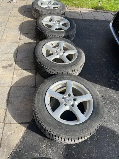 4 tires used for a single winter. Tires on alloy rims. Lots of tread remaining. Located in west end.