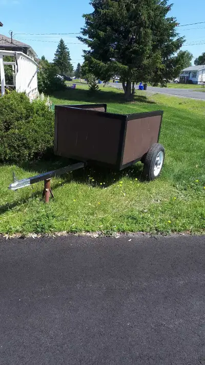 Sturdy all purpose trailer .Great for towing behind ATV.. or quad. Has brand new rims and tires,axle...