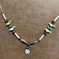 Necklace with puka shells, torquoise, and mother of pearl