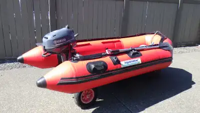 Dinghy boat and Yamaha motor. This dinghy has been used only 4 times. It comes with a metal fold up...