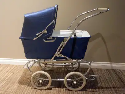 Rare Vintage baby stroller/ pram, good shape, chrome undercarriage, wheels are good , frame is good,...