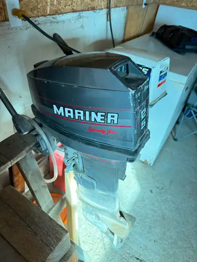 Evinrude 7.5 hp outboard with tank Has a few quirks but runs good. $350 Mariner 25 hp outboard Needs...