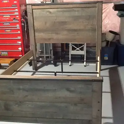 Double/full size bed frame by ashley furniture Includes headboard, footboard and rails Made of engin...