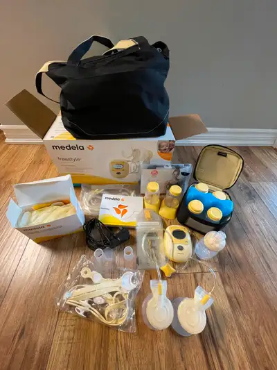 Medela Freestyle ensemble tire-lait/Medela Freestyle breast pum Tire-lait double électrique à usage...