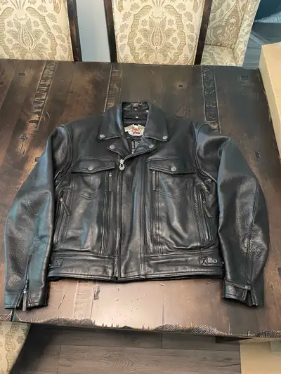 Men’s size Medium Harley Davidson black leather riding jacket with removable insulated liner. $225.0...