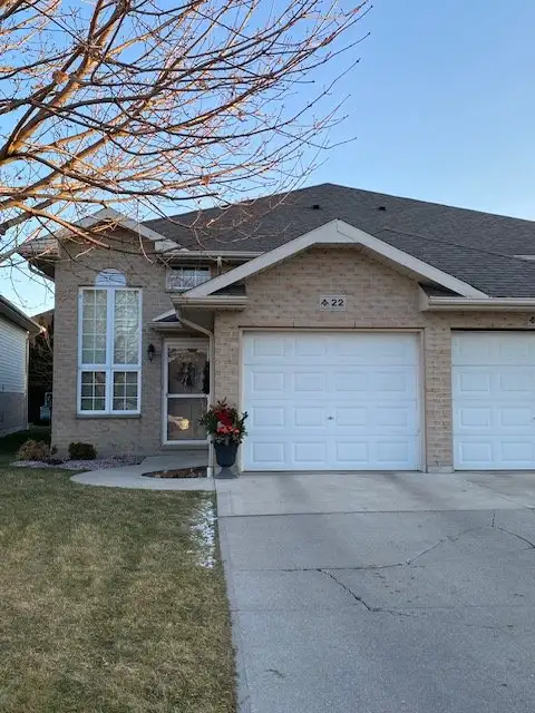 Move-in ready semi-detached raised ranch with attached garage, located in a family-friendly north-si...