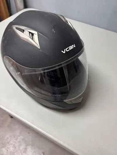 This VCAN helmet is a full-face motorcycle helmet designed for safety and comfort on the road. This...