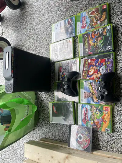 Selling this Xbox 360 with 2 controllers and some games. Asking $80 cash 6472108971